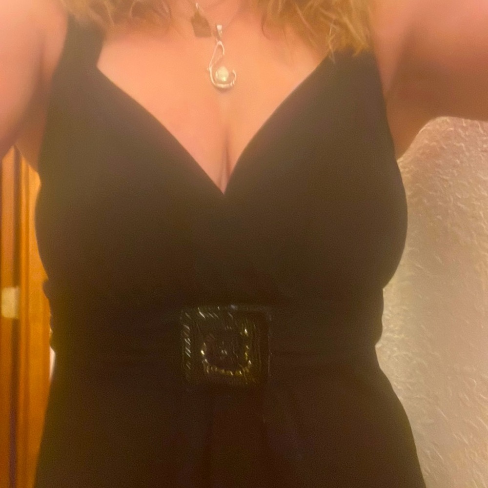 Mid length black dress. Elegant and comfortable. Dress it up or down